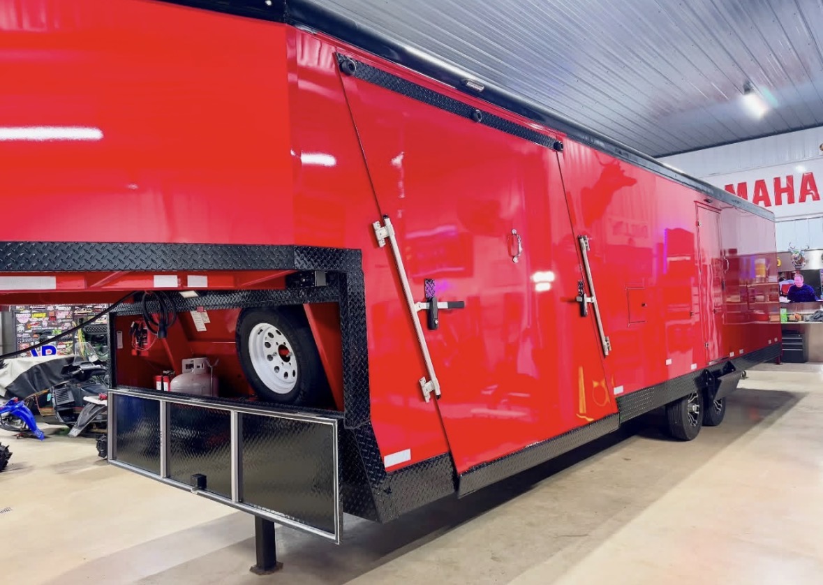 Shiny red enclosed trailer
